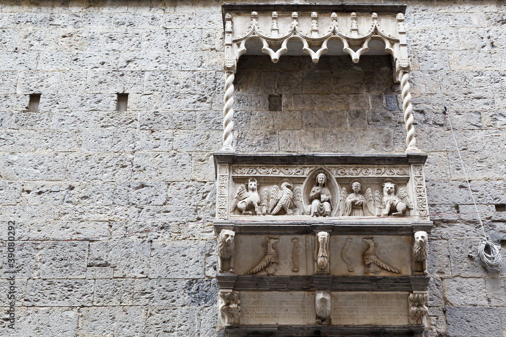 Building with Marble Balcony and Relief in Genoa, Italy Building with Marble Balcony and Relief in Genoa, Italy