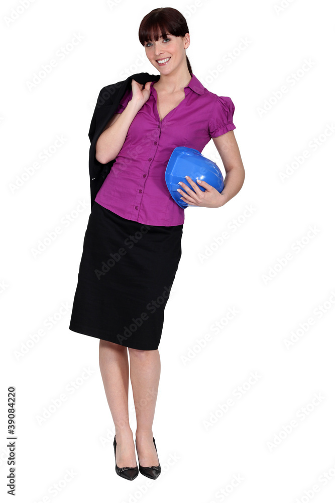 cute female archtect standing in studio cute female archtect standing in studio