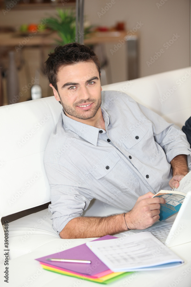 Man studying at home