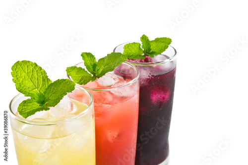 Three glass of apple,grape and strawberry juice