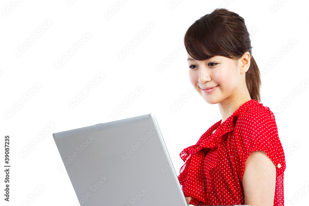 Beautiful asian woman using a laptop computer Beautiful asian woman using a laptop computer
