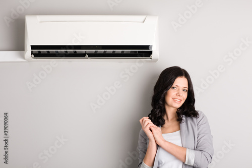 beautiful girl and air conditioner