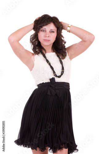 Beautiful young woman in dress isolated