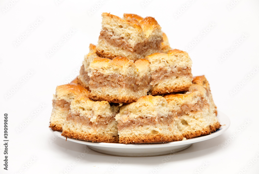 Portion pie with apple filling isolated on white