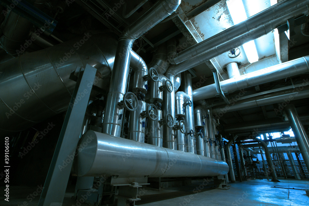 Industrial zone, Steel pipelines and cables in blue tones Industrial zone, Steel pipelines and cables in blue tones