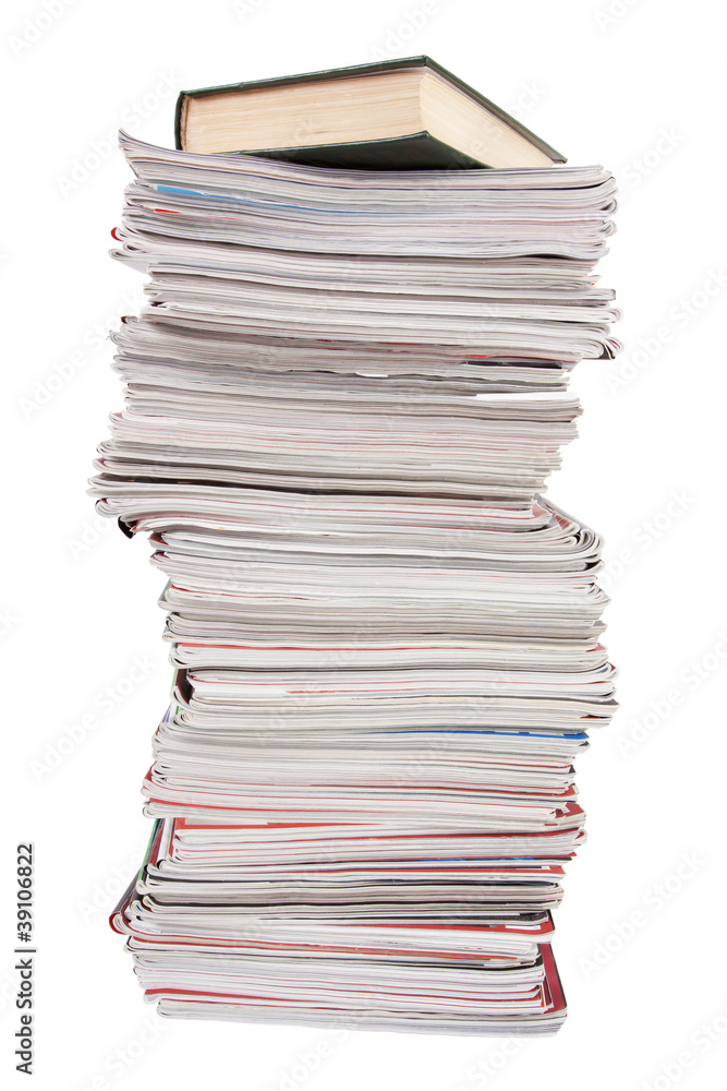 Stack of old magazines and a book Stack of old magazines and a book