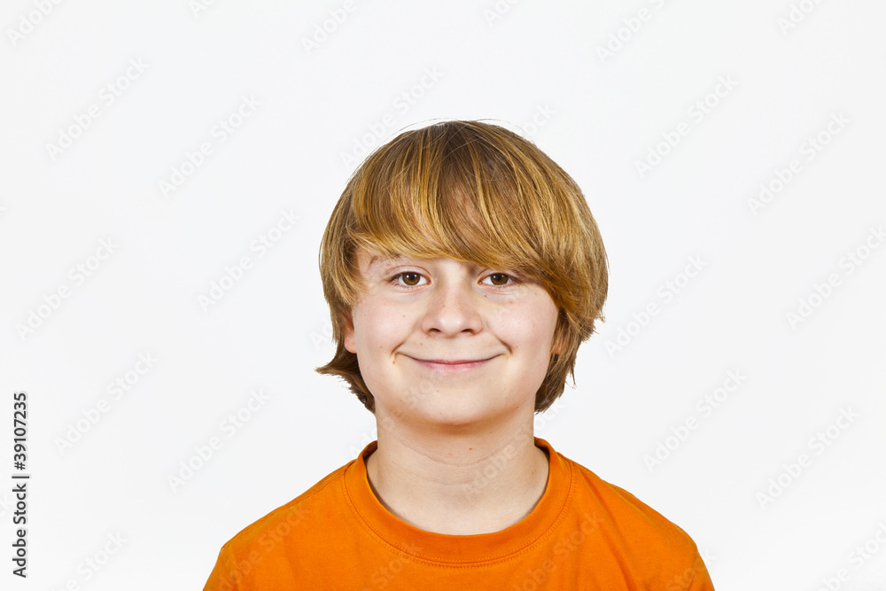 happy smiling boy in orange shirt happy smiling boy in orange shirt