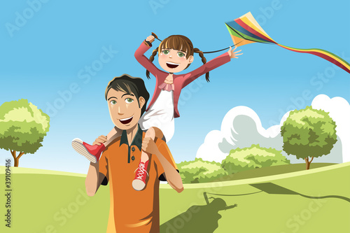 Father daughter playing kite