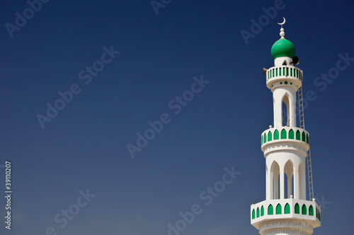 Wallpaper Mural White mosque with minaret against blue sky (Sur, Oman)