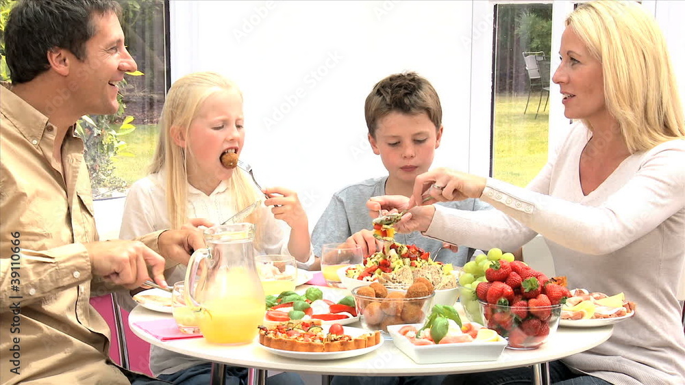 Young Family Eating Healthy Meal Young Family Eating Healthy Meal