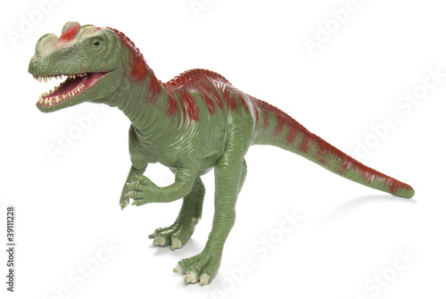 Toy Tyrannosaurus Rex coming to eat you on white background