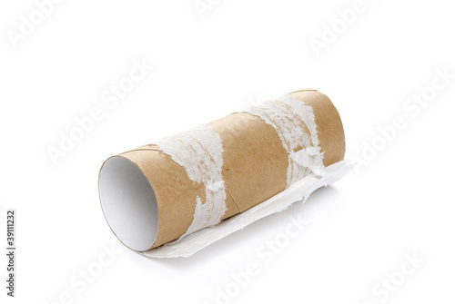Empty toilet paper on white background
