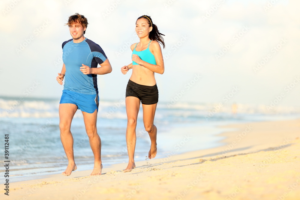 Couple running on beach Couple running on beach