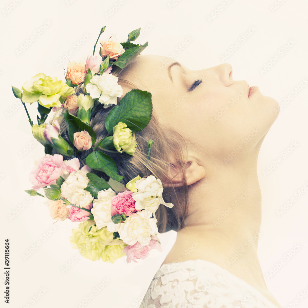 Fototapeta premium Beautiful young girl with flowers