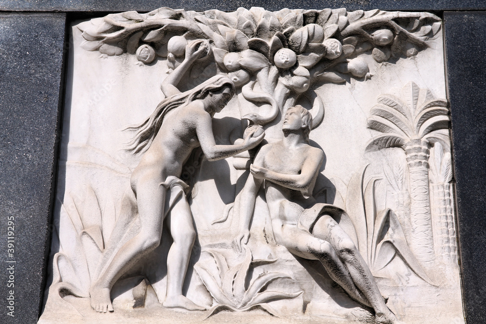 Adam and Eve - bas relief sculpture on a grave Stock Photo | Adobe Stock