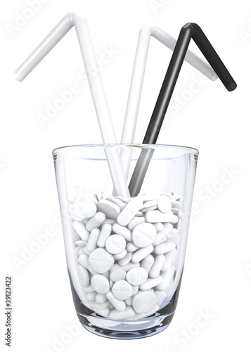 verschiedene weiße Tabletten in Glas mit Strohhalmen