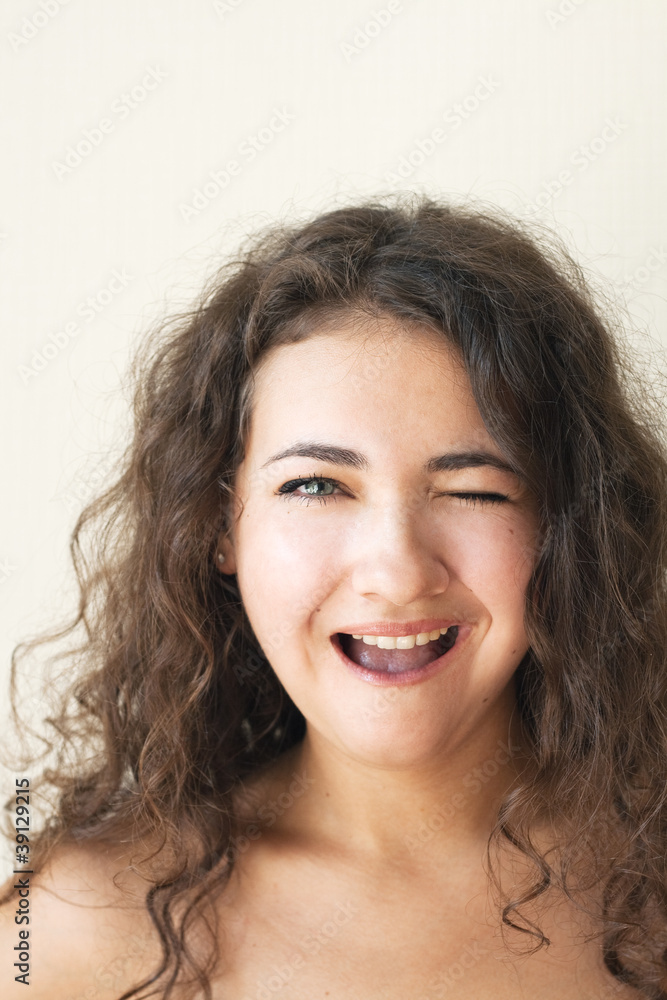 Portrait of a cute brunette with beautiful curls Portrait of a cute brunette with beautiful curls