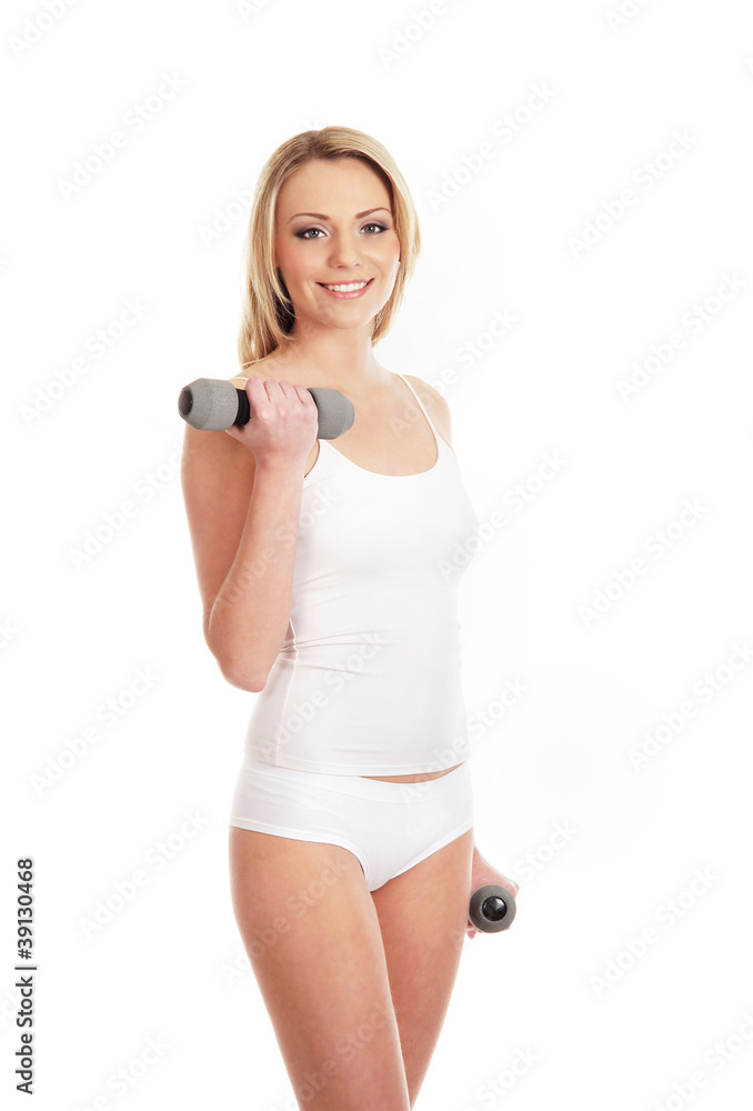 A young and fit blond woman on a white background A young and fit blond woman on a white background