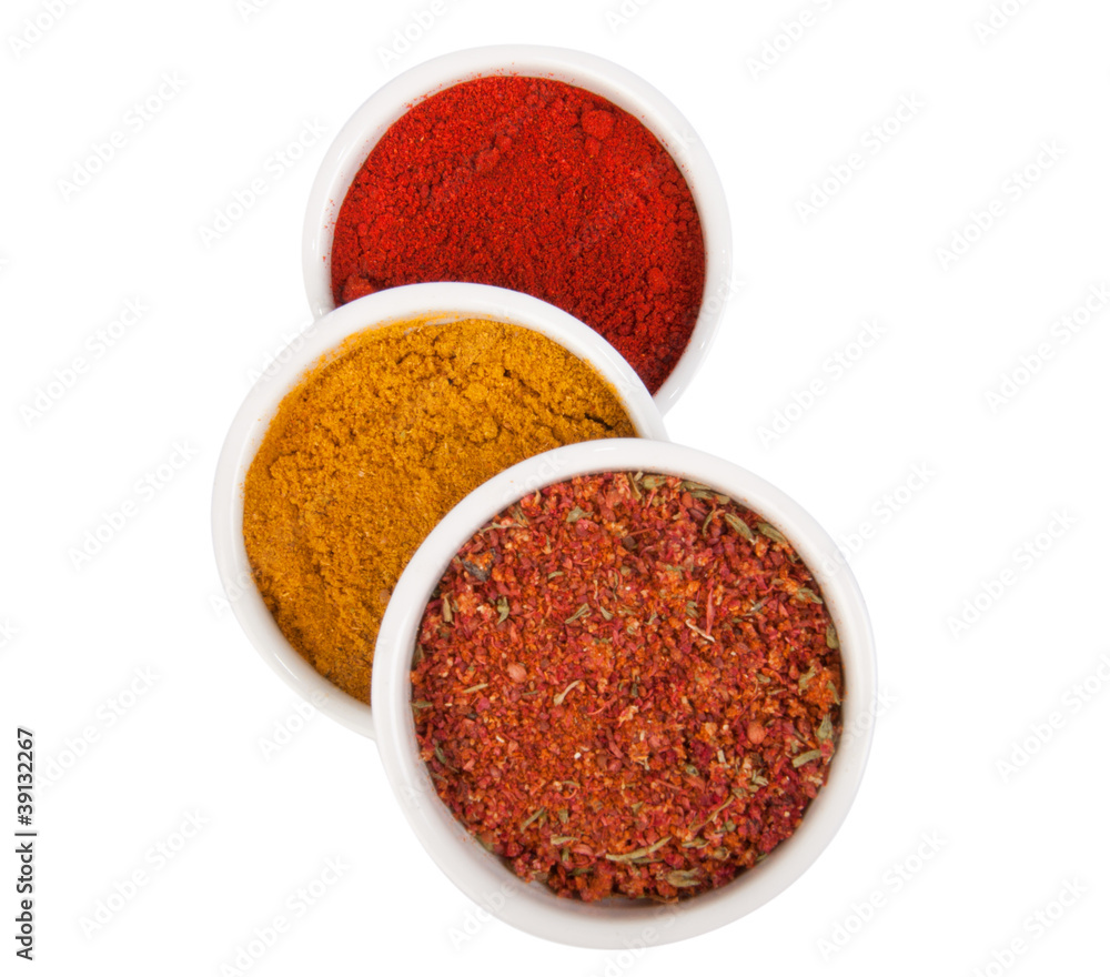 Spices in porcelain plates Spices in porcelain plates