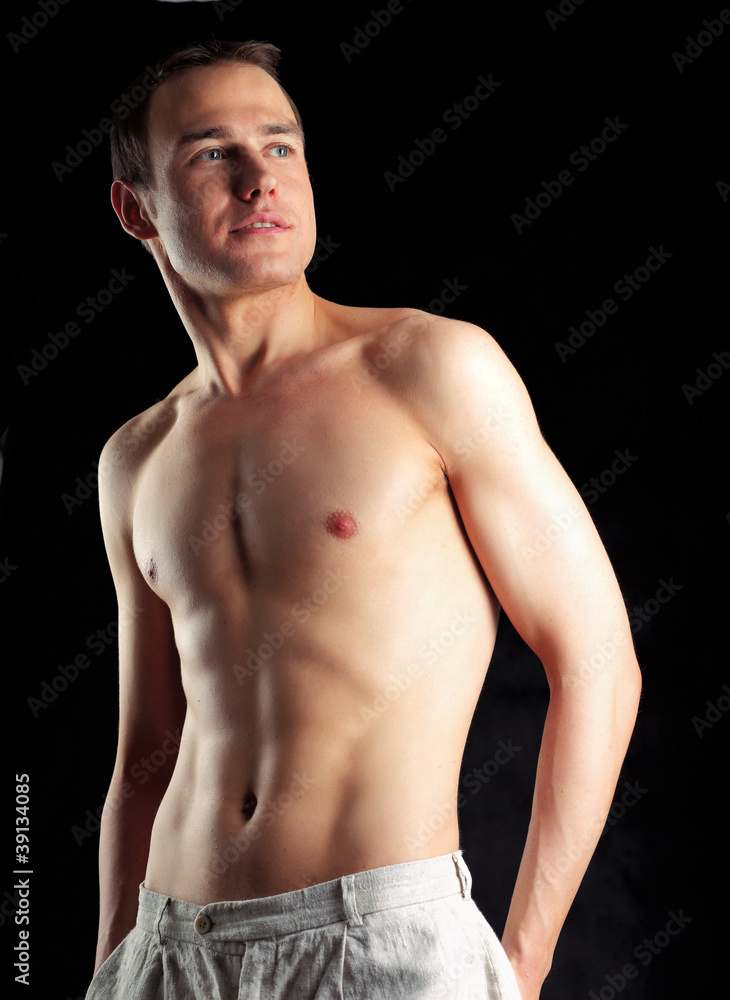 Fototapeta premium Portrait of a naked muscular man