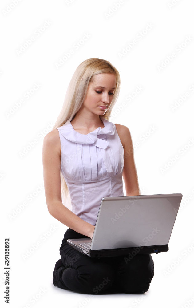 A beautiful girl sitting with a laptop A beautiful girl sitting with a laptop