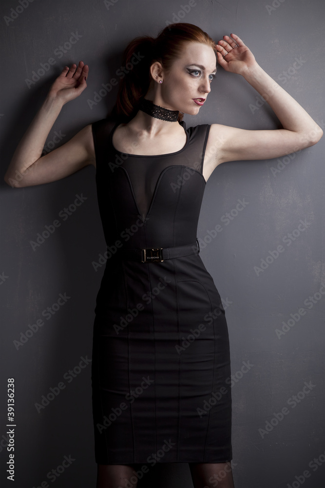 Redhead young girl in black dress Redhead young girl in black dress