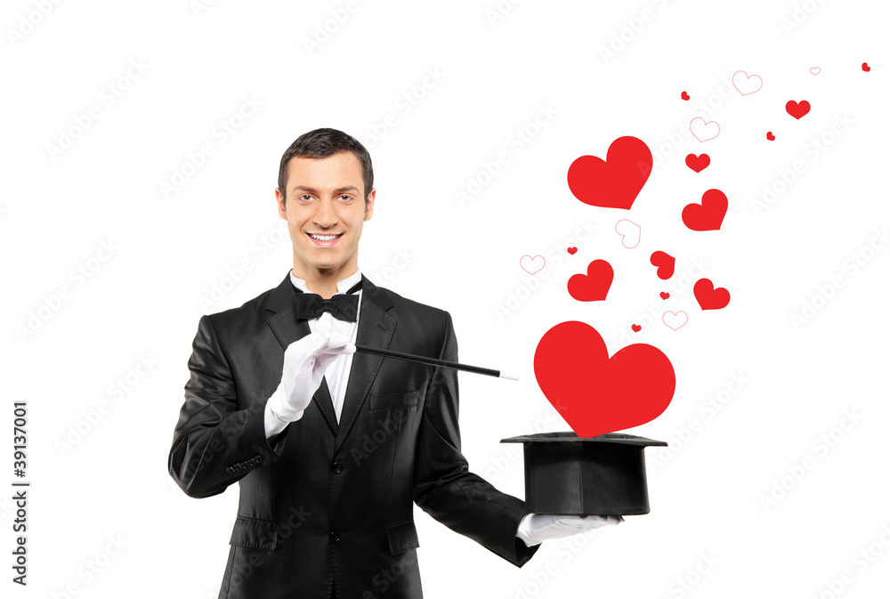Smiling magician and a red heart shaped objects coming out of a Smiling magician and a red heart shaped objects coming out of a