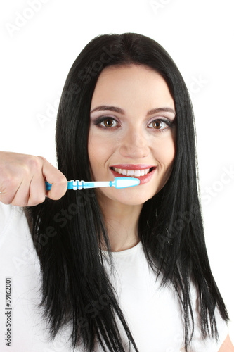 beautiful young girl holding toothbrush isolated on white