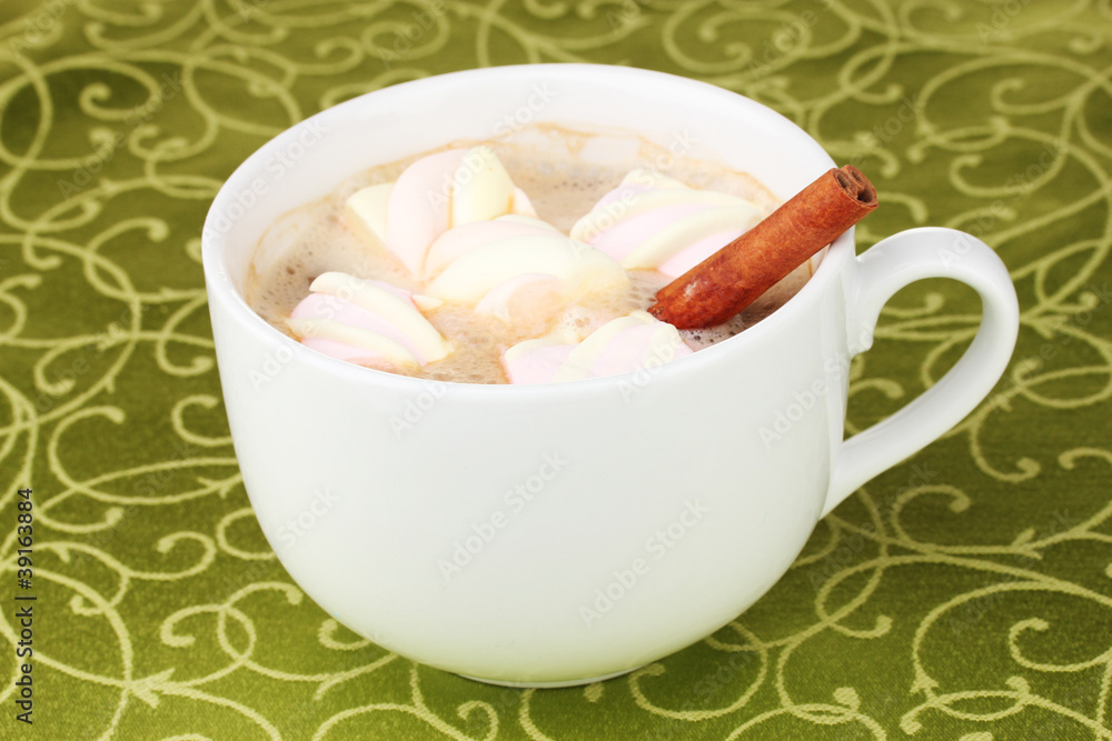 Cup of cappucino with marshmallows and cinnamon Cup of cappucino with marshmallows and cinnamon