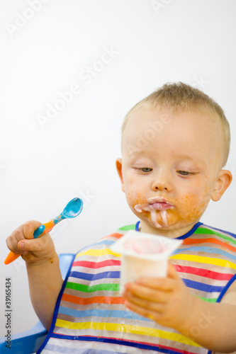 Infant Eating Yoghurt Messily