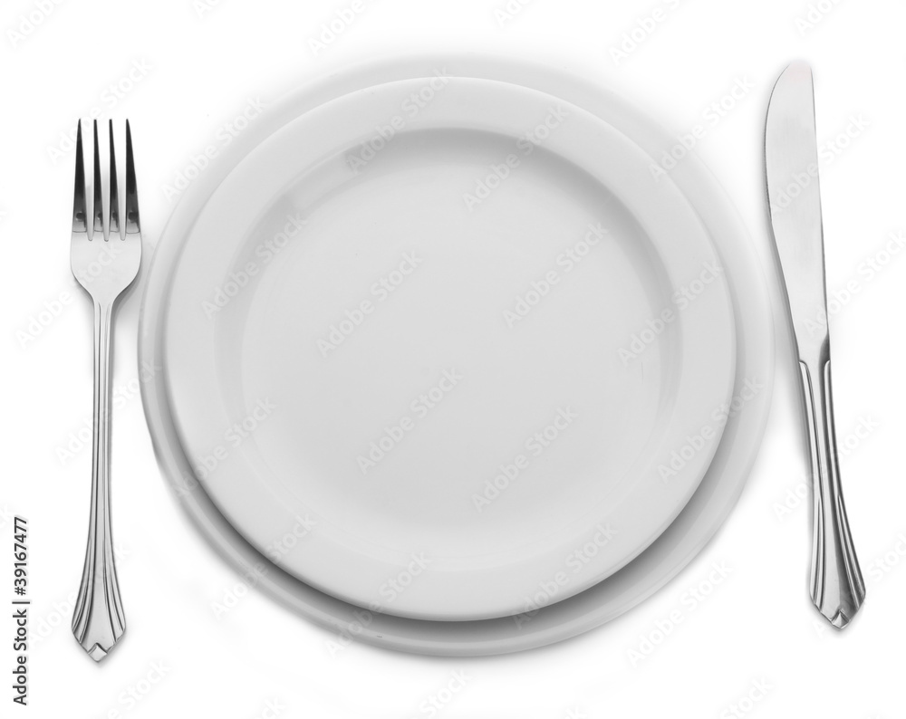 White empty plate with fork and knife isolated on white White empty plate with fork and knife isolated on white