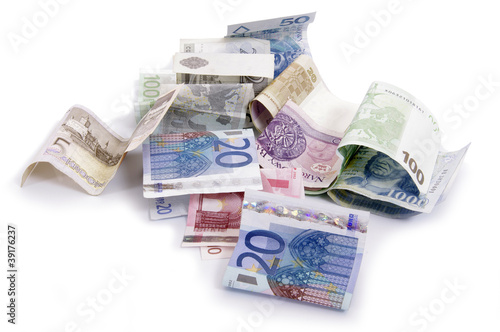 Euro and zlot banknotes on a table