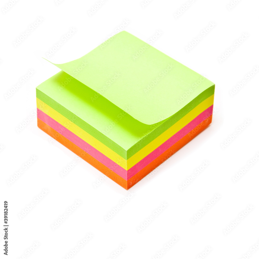 Post-it note isolated on a white studio background. Post-it note isolated on a white studio background.