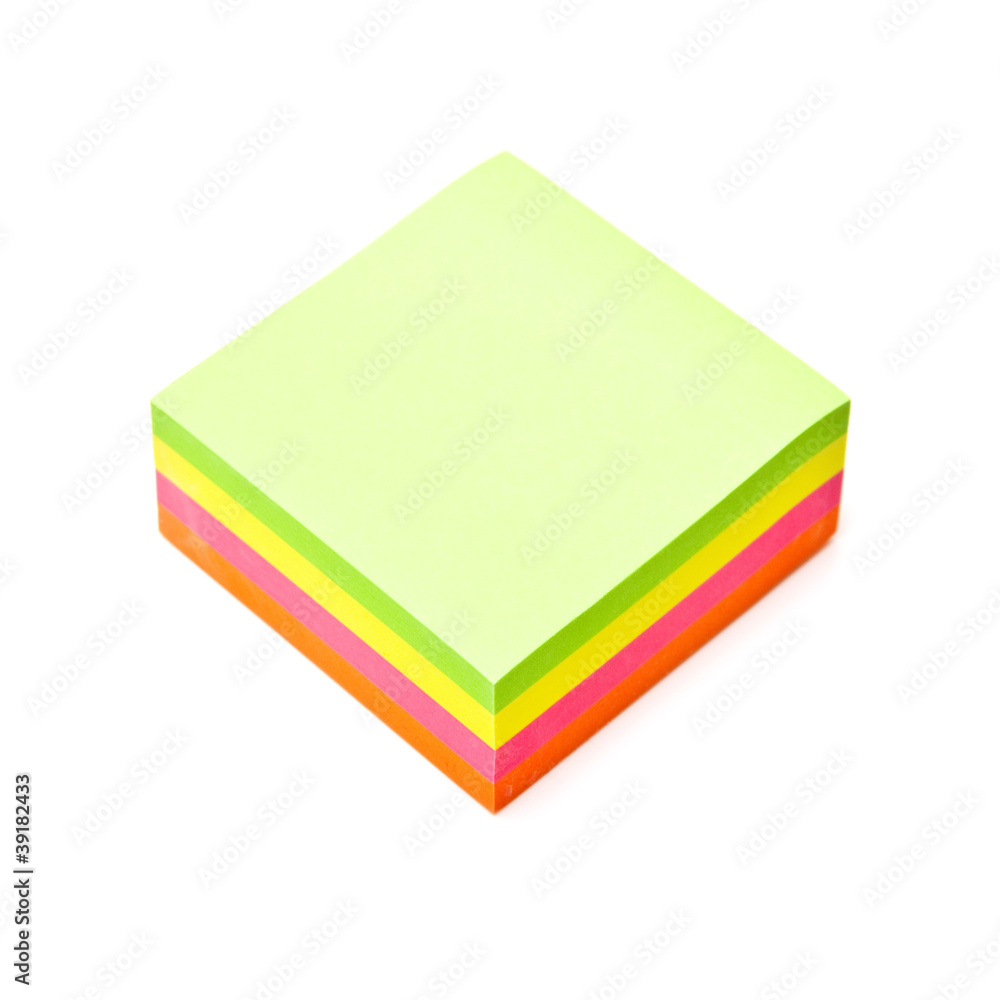 Sticky note pad isolated on a white studio background. Sticky note pad isolated on a white studio background.