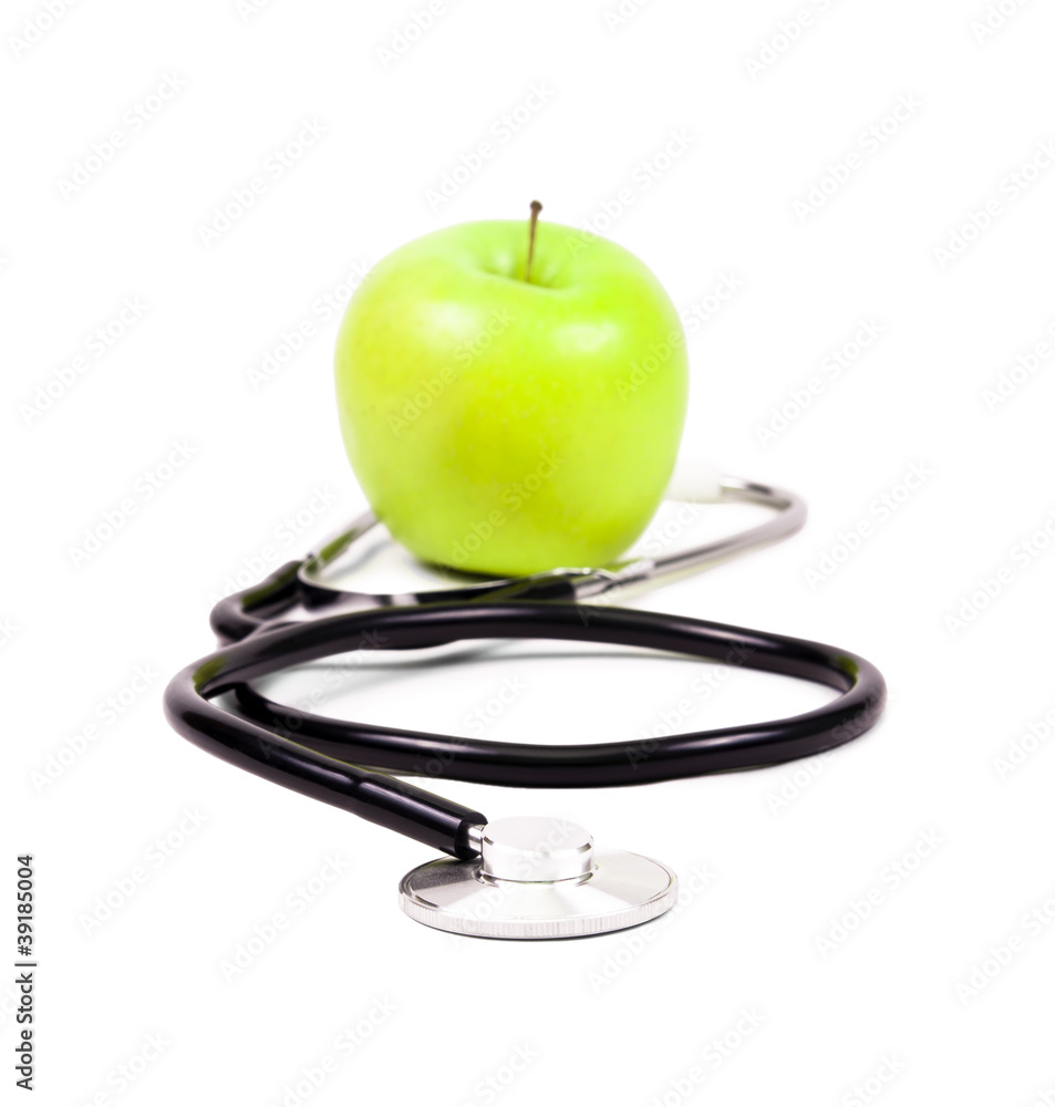 Medical stethoscope and green apples. Medical stethoscope and green apples.