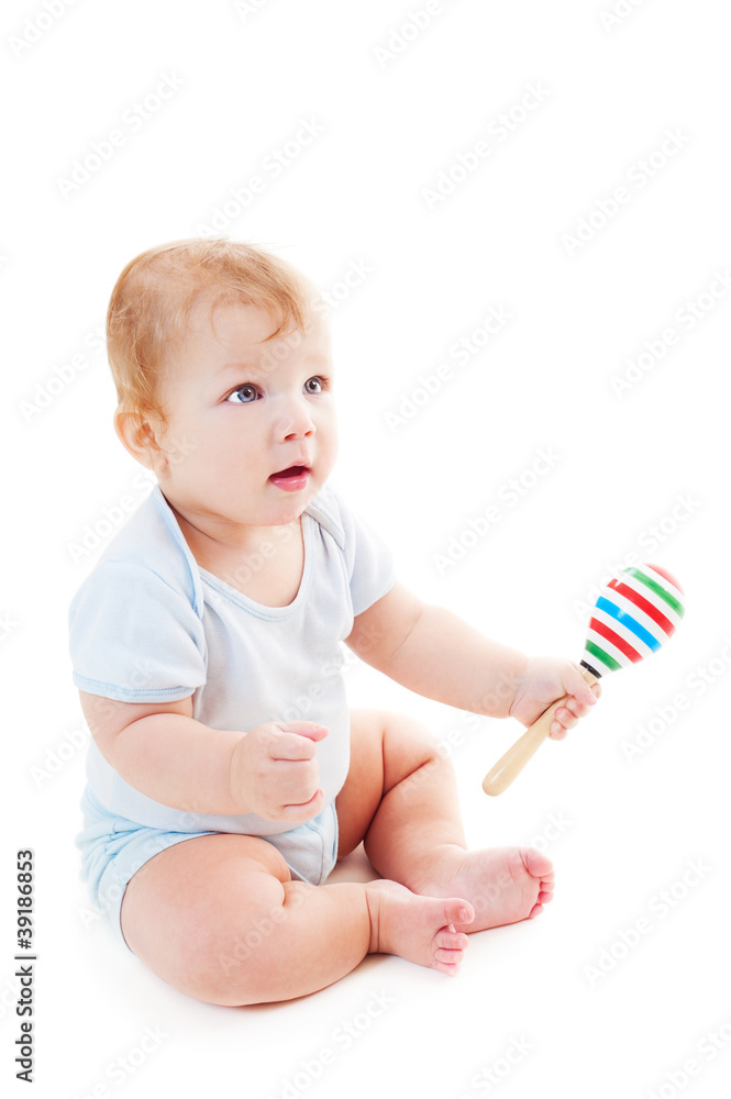 portrait of baby boy with rattle portrait of baby boy with rattle