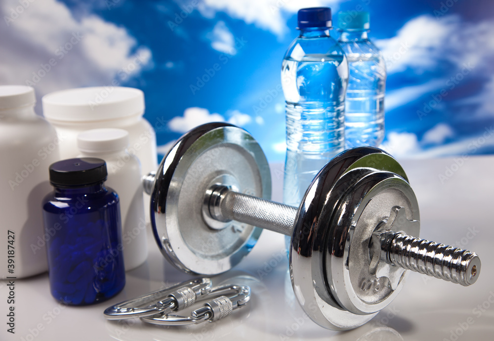 Obraz premium fitness barbell and supplements