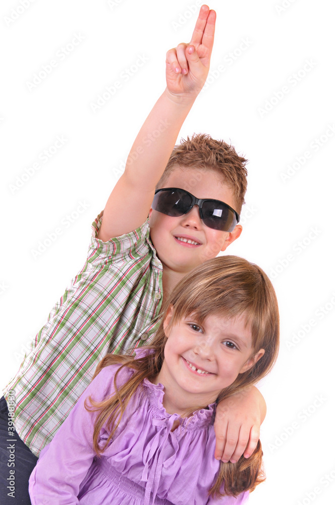 Smiling boy and girl on a white background