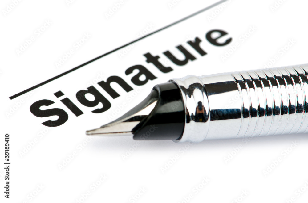Obraz premium Pen and signature isolated on white