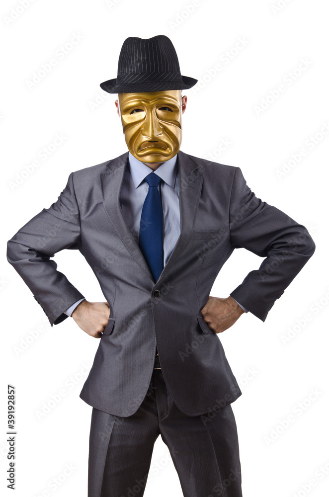 Businessman with mask concealing his identity Businessman with mask concealing his identity