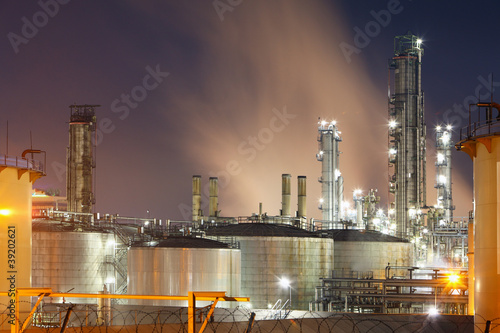 Petrochemical oil and gas refinery plant in night