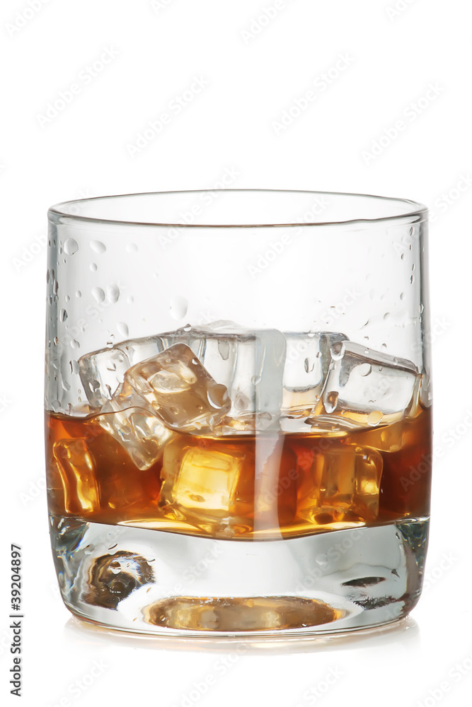glass of wjiskey with ice cubes glass of wjiskey with ice cubes