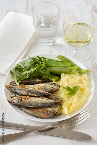 fried sardines with mashed potato and green beans