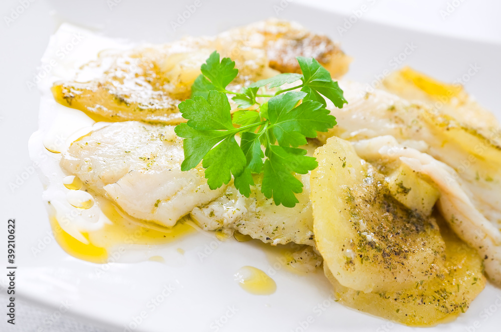 Fish with potatoes.