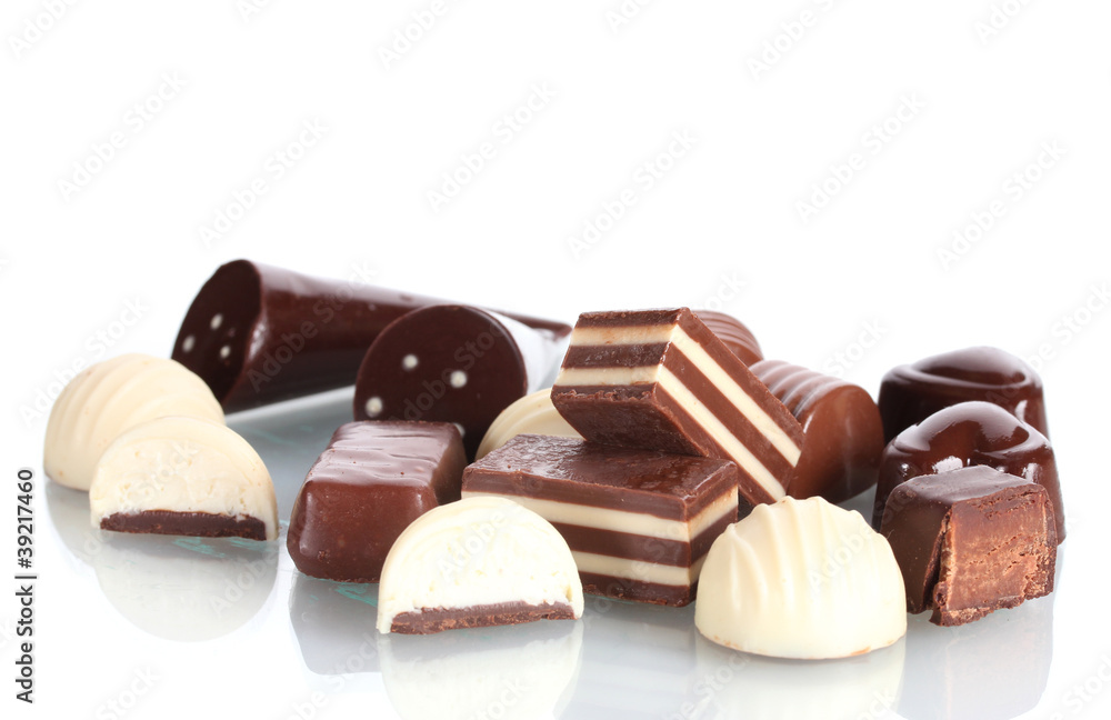 Many different chocolate candy isolated on white Many different chocolate candy isolated on white