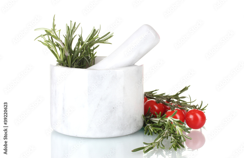 fresh green rosemary in mortar and tomatoes cherry isolated