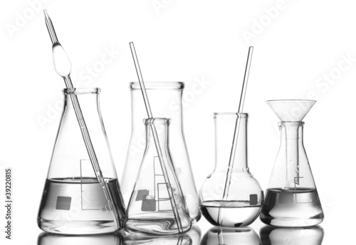 Different laboratory glassware with water and empty with © Africa Studio