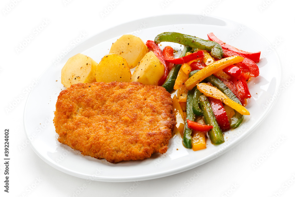 Pork chop, roasted potatoes and vegetables Pork chop, roasted potatoes and vegetables