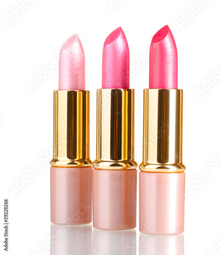 beautiful pink lipsticks isolated on white