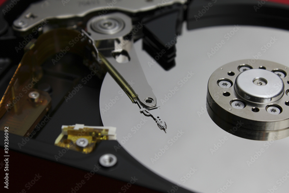 Close up of opened hard disk drive Close up of opened hard disk drive